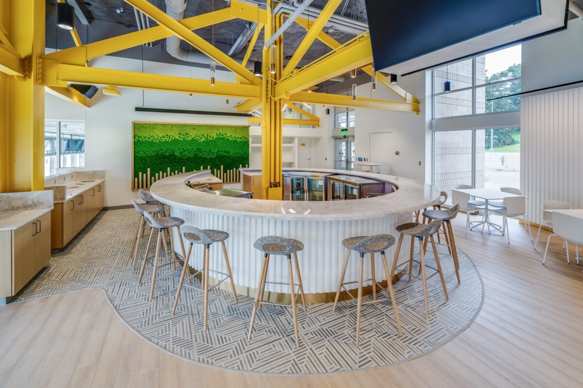 Circular seating with yellow beams in the middle