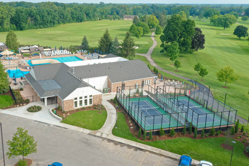 an overhead view of the Cascade Hills Country Club showcasing driveway and and main building.