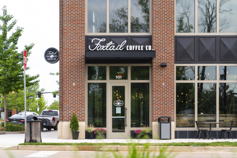 Exterior corner shot of Foxtail Coffee — Ada Village